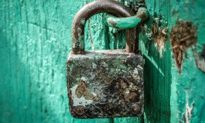 Rusty Padlock On Blue Door Rusty Padlock On Blue Door ALT